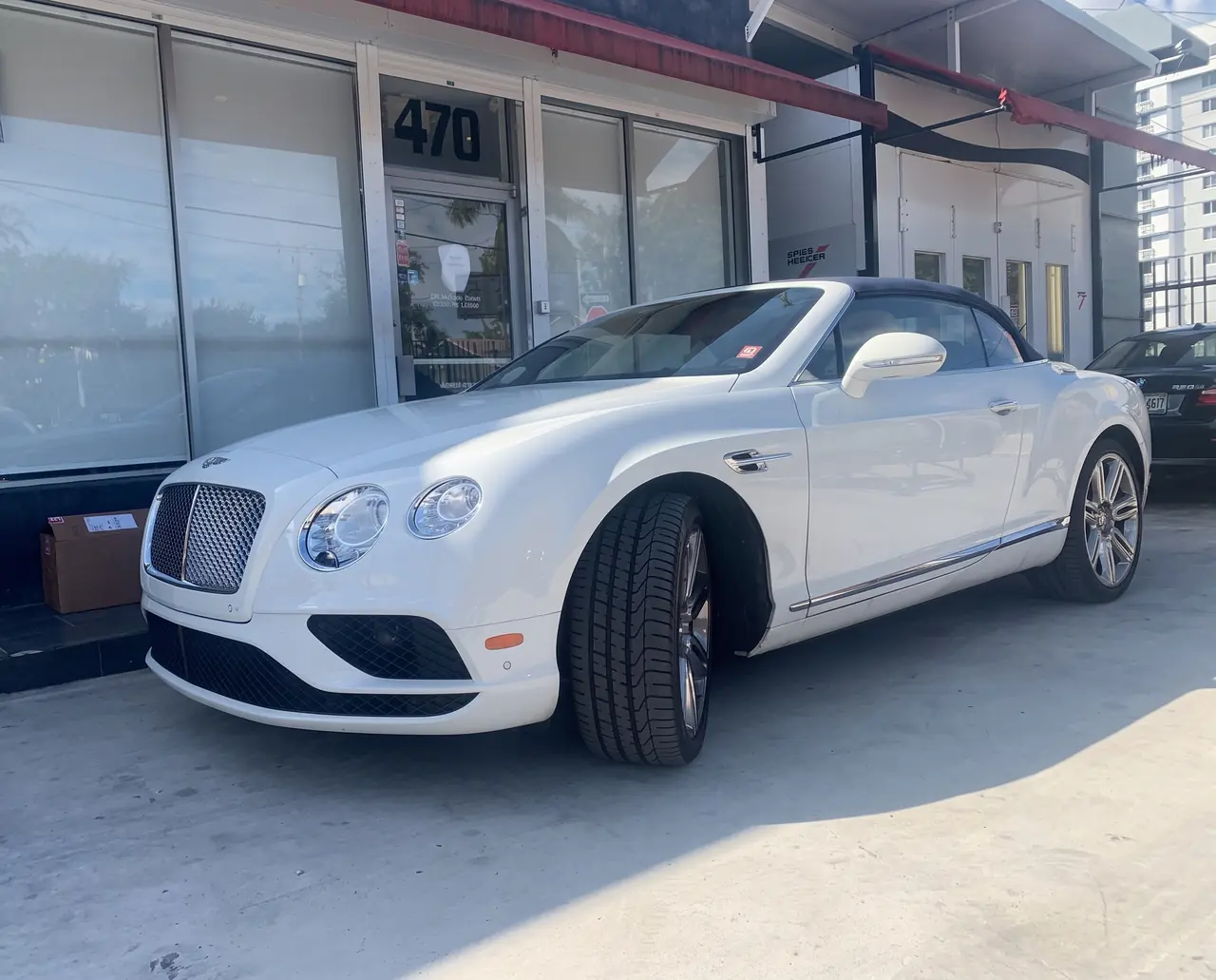 A finished Bentley convertible at the Giant Motors entrance